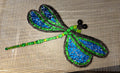 Libellule en mosaique sur filet